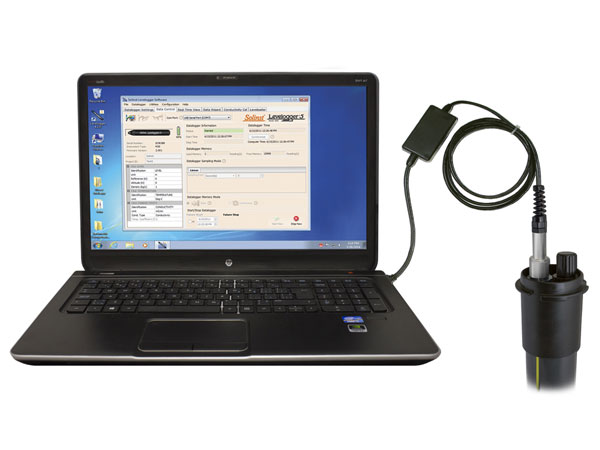 field laptop connected to top of solinst levelogger 5 direct read cable using pc interface cable