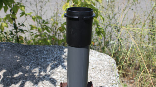 Inserting the Solinst AquaVent Hanger Bracket Through Top of Well Cap solinst aquavent aquavent user guide vented cable support hanger bracket solinst aquavent cable support hanger bracket securing aquavent securing solinst aquavent securing solinst aquavent cable in well image