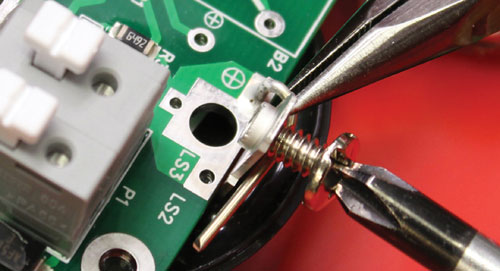 to connect the circuit board loosen the two screws from the solinst water level meter sonalert
