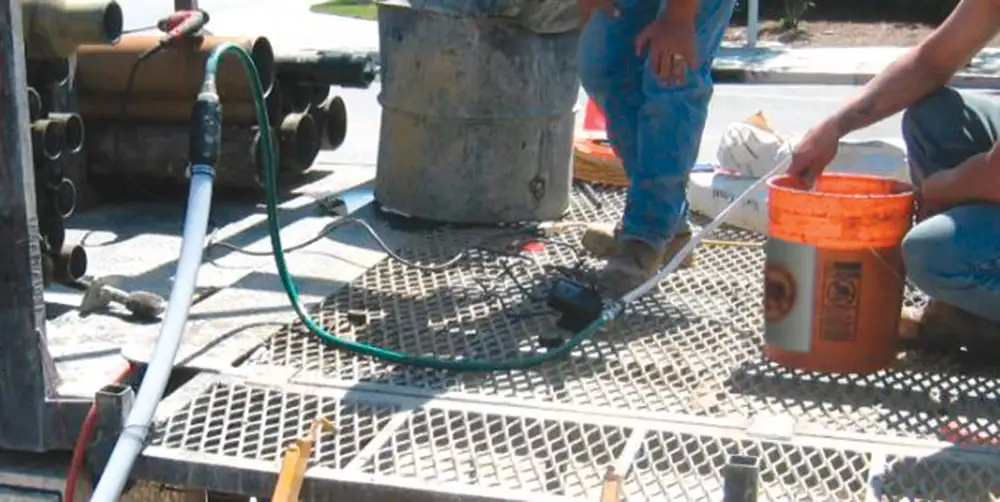 1 inch diameter grout line connected to grout adaptor attached to bottom of cmt multilevel system